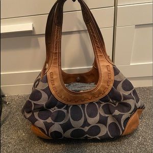 Denim and light brown Coach Handbag.